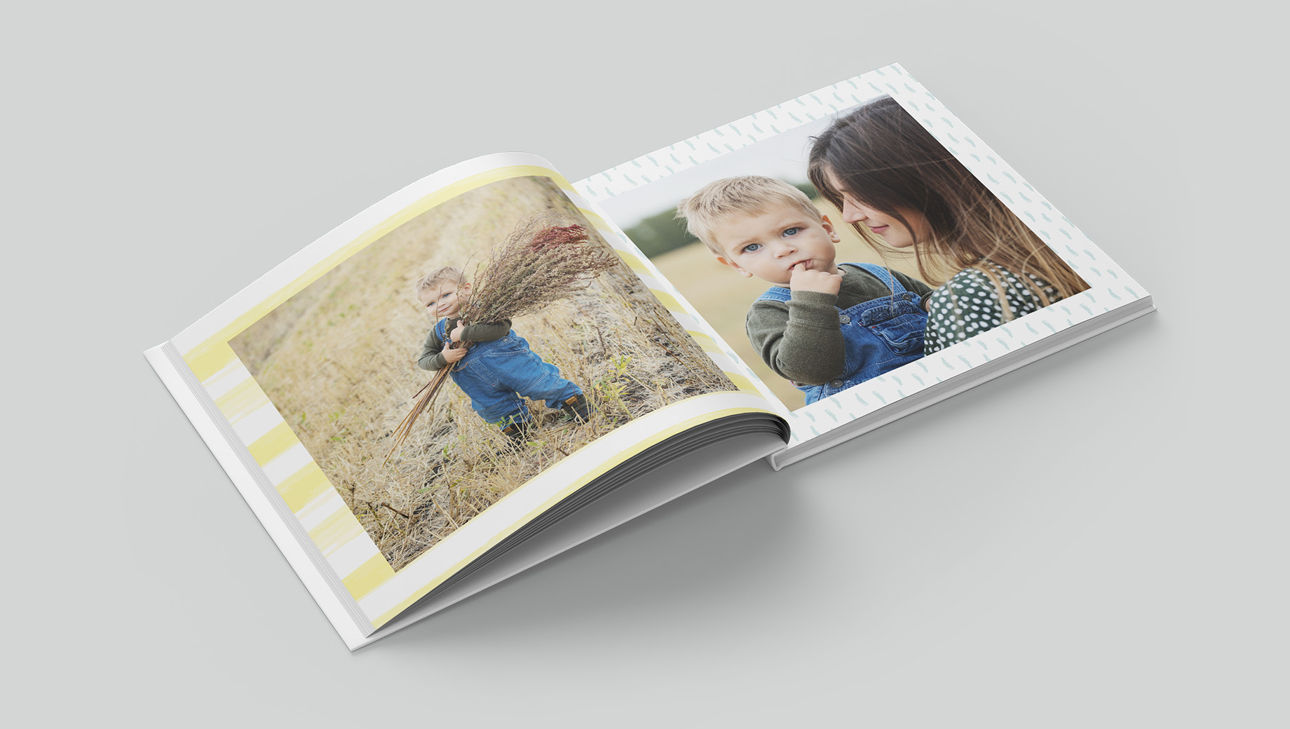 Open pages of an paint styled photobook