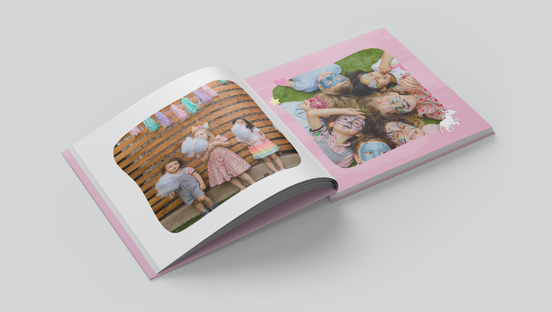 Open pages of a unicorn themed photobook