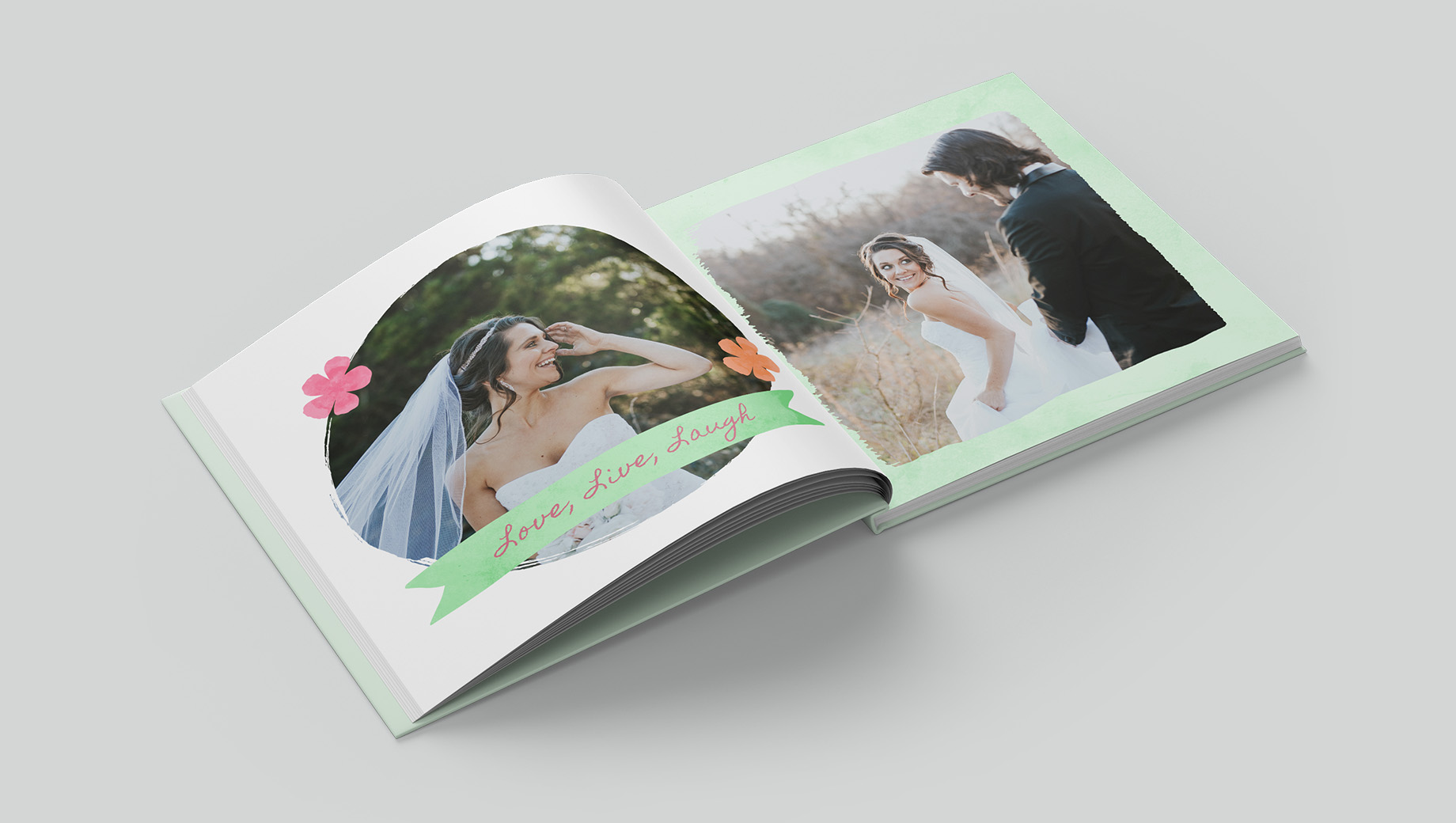 Open pages of a watercolour styled photobook